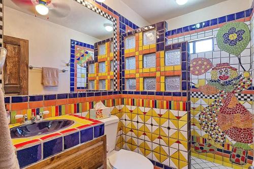a bathroom with a sink and a toilet and a shower at Casa San Miguel - Beachfront House in Playa Encanto