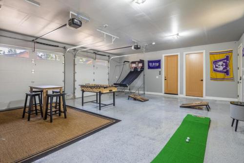 a room with a ping pong table and a ping pong ball at Suncadia 5 Bdrm Home Nestled in the Forest Perfect Private Retreat in Cle Elum
