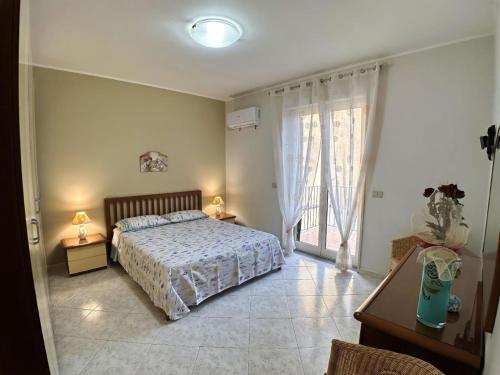 Легло или легла в стая в Gemütliches Appartement in Stazzo mit Grill, Garten und Terrasse