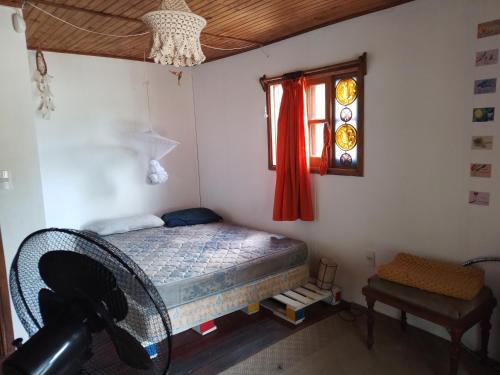מיטה או מיטות בחדר ב-Cabaña en entorno natural