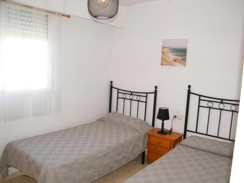 Lova arba lovos apgyvendinimo įstaigoje Apartamento Playa de Gandía, 3 dormitorios, 6 personas - ES-314-14