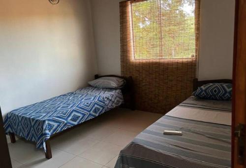 Postel nebo postele na pokoji v ubytování Duplex Aeropuerto c/cochera cerrada