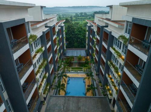 an aerial view of the courtyard of an apartment building at Carnival De Goa in Nerul