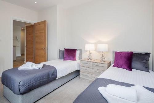 Кровать или кровати в номере Luxury Apartments 2 Bedrooms Central Maidenhead