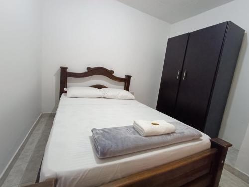 Katil atau katil-katil dalam bilik di Apartamento familiar San Gil