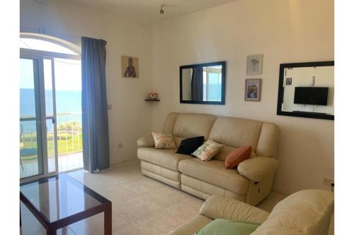 Posezení v ubytování Seafront apartment in Gozo, Marsalforn - Happy Rentals