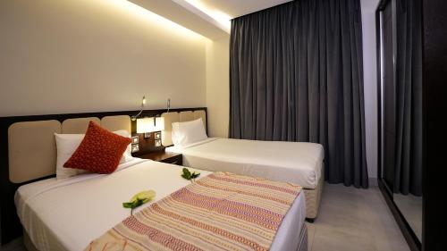 Saray Hotel Apartmentsにあるベッド