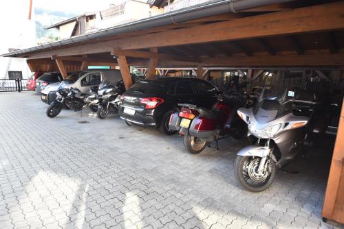 a group of motorcycles parked in a parking lot at Stöcklbauer Kirchberg in Tirol in Kirchberg in Tirol
