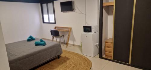 TV a/nebo společenská místnost v ubytování Bella Residence