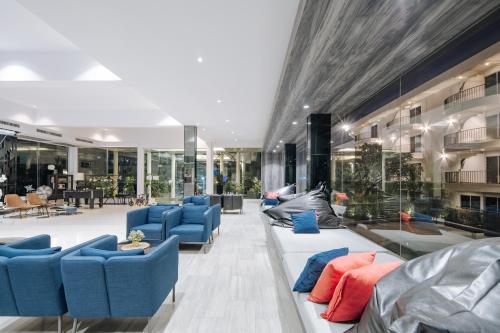 Χώρος καθιστικού στο Mittapan Hotel
