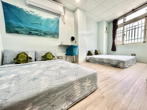 宿室唷 tesisinde bir odada yatak veya yataklar