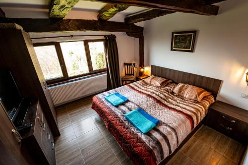 Llit o llits en una habitació de Apriltsi Hills