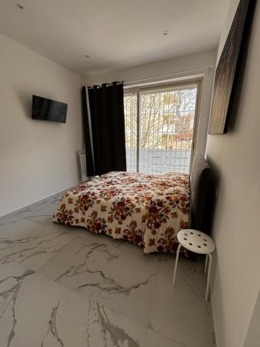 a bedroom with a bed and a window at Villa Life in San Donato Milanese