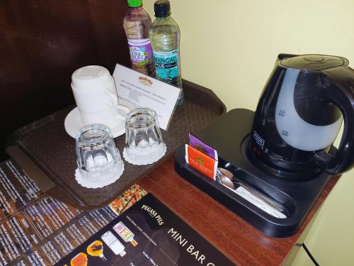 Pegasa Pils Spa Hotelにあるコーヒーまたはお茶