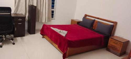 Ένα ή περισσότερα κρεβάτια σε δωμάτιο στο ROYAL NEST PREMIUM - Magarpatta City