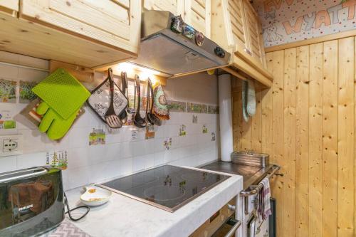 Kuchyň nebo kuchyňský kout v ubytování El Cormélo, Telve Ospitar