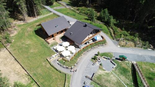an overhead view of a house on a hill at Ferienwohnung Werraquell Hütte in Masserberg