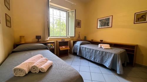 Postel nebo postele na pokoji v ubytování Villa Fortunato