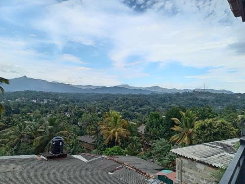 a view of the mountains from the roof of a house at Dreamscape home stay in Kandy