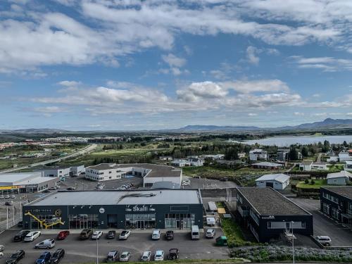 an aerial view of a town with a parking lot at Icelandic Apartments by Heimaleiga in Reykjavík