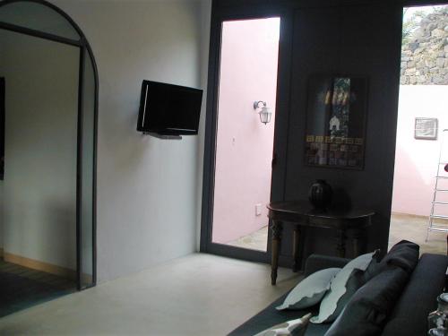 TV/Unterhaltungsangebot in der Unterkunft Antico Dammuso Venedisè