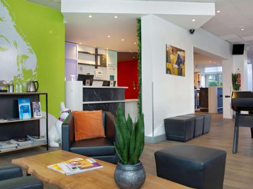 Гостиная зона в ibis Styles Cannes Le Cannet