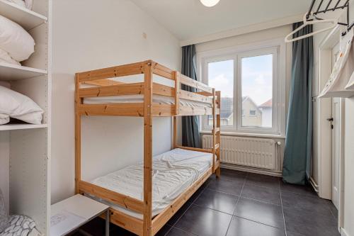 Ένα ή περισσότερα κρεβάτια σε δωμάτιο στο Villa Manalou 1ev