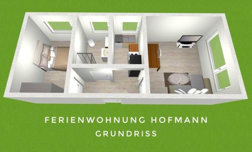 a rendering of a floor plan of a house at Ferienwohnung Hofmann in Freudental