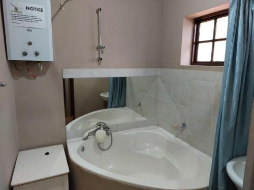 Koupelna v ubytování Tumuga Private Cottage Mokopane