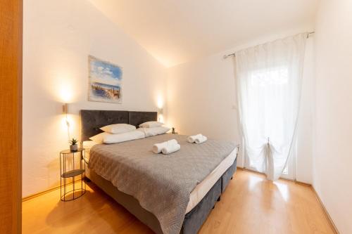 Ένα ή περισσότερα κρεβάτια σε δωμάτιο στο House Edvard