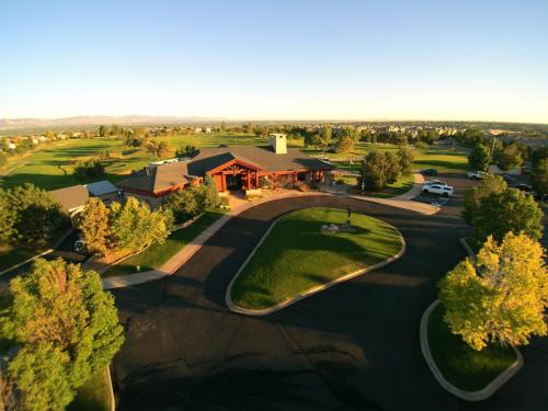 an aerial view of a house with a golf course at Home2 Suites by Hilton Denver Highlands Ranch in Highlands Ranch