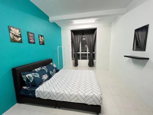 Katil atau katil-katil dalam bilik di Mutiara Homestay at Emerald Avenue Brinchang