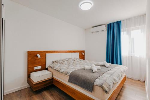 Postel nebo postele na pokoji v ubytování Bečići lux