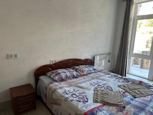 Ένα ή περισσότερα κρεβάτια σε δωμάτιο στο Апартаменти на вул. Біла,5а