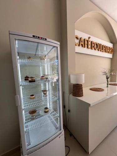 a refrigerator with some food inside of it at GRAN HOTEL VILLAGUAY in Villaguay