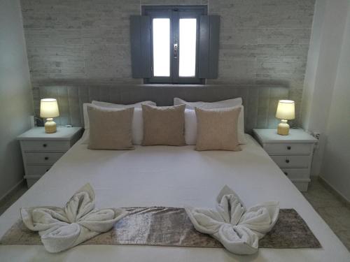 Postel nebo postele na pokoji v ubytování Hilltop Serenity Villa
