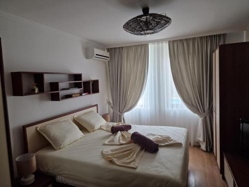 Postel nebo postele na pokoji v ubytování Apartment Petkovi - Saint Vlas