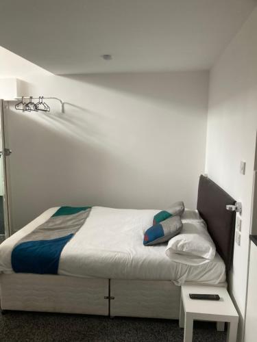 Uma cama ou camas num quarto em Palatine Aparthotel