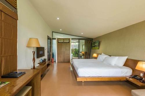 Villa R331 Forest Dai Lai Resortにあるベッド