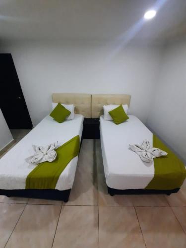 Ένα ή περισσότερα κρεβάτια σε δωμάτιο στο Hotel Zafiro Boutique
