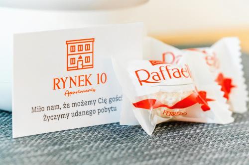 a box of ryx crackers next to a sign at Rynek 10 Apartments in Lublin