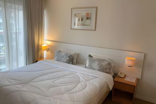 En eller flere senge i et værelse på Get a Flat - 1001 - Jardins/ Paulista