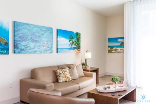 a living room with a couch and a table at Perfect Relax - Hollywood Beach - Amazing Pool in Hollywood