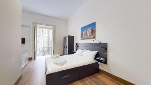 Una cama o camas en una habitación de Ai Crociferi affittacamere