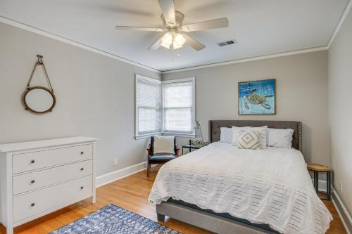 a bedroom with a bed and a ceiling fan at Updated Columbia Home with Patio - 4 Mi to USC! in Columbia