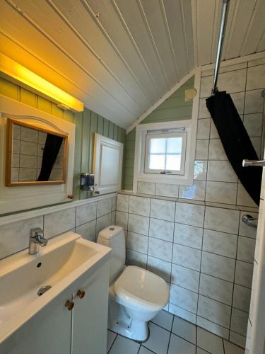 Koupelna v ubytování Midnattsol rom og hytter