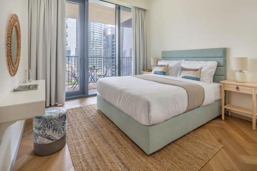 A bed or beds in a room at Frank Porter - BLVD Heights T1