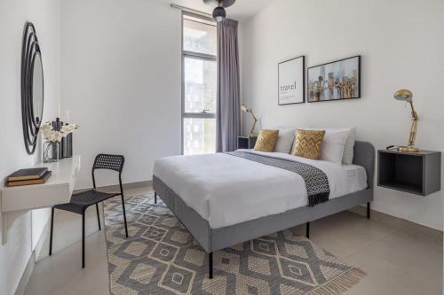 Postel nebo postele na pokoji v ubytování Frank Porter - The Pulse Residences