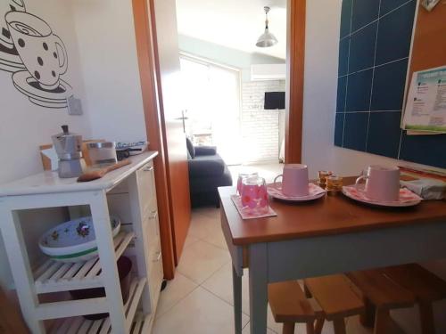 Kuchyň nebo kuchyňský kout v ubytování Casa di Arturo Mansarda