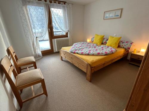 Una cama o camas en una habitación de Chalet Sonnenschein